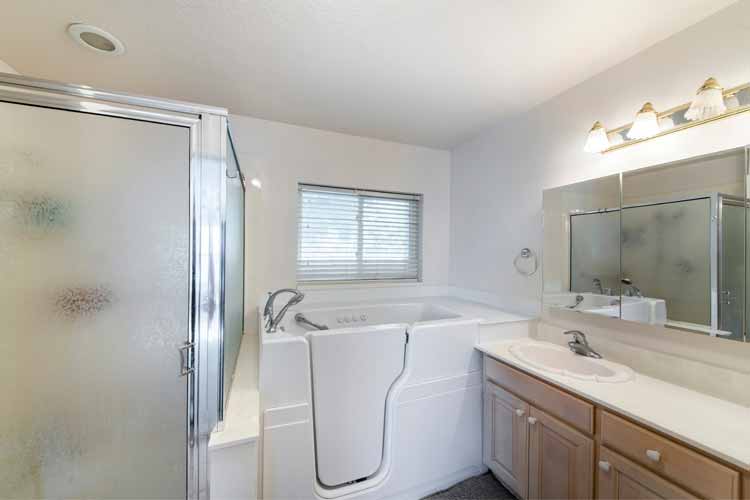 Shower and a walk in bathtub